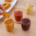 Acopa 4 oz. Round Glass Sauce Cup - 12/Case Acopa 4 oz. Round Glass Sauce Cup - 12/Case