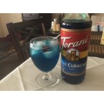 Torani Blue Curacao Flavoring Syrup 750 mL Glass Bottle - 12/Case