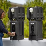 Cambro 2.5 Gallon Black Portable Handwash Station with Soap and Multi Fold Paper Towel Dispenser and Riser