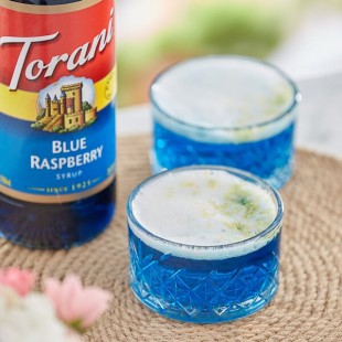 Torani Blue Raspberry Flavoring Syrup 750 mL Glass Bottle - 12/Case Torani Blue Raspberry Flavoring Syrup 750 mL Glass Bottle - 12/Case