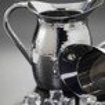 American Metalcraft 64 oz. Stainless Steel Hammered Finish Double-Walled Bell Pitcher HMWP64 - 6/Case American Metalcraft 64 oz. Stainless Steel Hammered Finish Double-Walled Bell Pitcher HMWP64 - 6/Case
