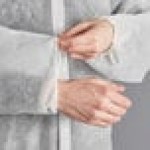 Lavex White 26 GSM Standard Weight Polypropylene Snap Front Long Sleeve Lab Coat with Elastic Wrists - 2XL - 30/Case Lavex White 26 GSM Standard Weight Polypropylene Snap Front Long Sleeve Lab Coat with Elastic Wrists - 2XL - 30/Case