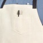 Uncommon Chef 3116 Ivory Customizable 100% Cotton Canvas Aura Bib Apron with Black Webbing and 3 Pockets - 34