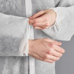 Lavex White 26 GSM Standard Weight Polypropylene Snap Front Long Sleeve Lab Coat with Elastic Wrists - XL - 30/Case Lavex White 26 GSM Standard Weight Polypropylene Snap Front Long Sleeve Lab Coat with Elastic Wrists - XL - 30/Case