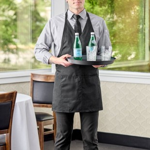 Uncommon Chef 3041 Black Customizable Poly-Cotton Twill V-Neck Tuxedo Apron with Adjustable Neck Strap and 2 Pockets - 28
