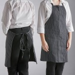 Choice Black and White Pinstripe Poly-Cotton Adjustable Bib Apron with 2 Pockets - 32