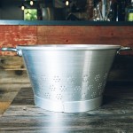 Matfer Bourgeat 529560 70.75 qt. Aluminum Conical Colander with Base and Handles
