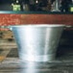 Matfer Bourgeat 529560 70.75 qt. Aluminum Conical Colander with Base and Handles