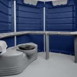 PolyJohn SA1-1016 We'll Care III Dark Blue Wheelchair Accessible Portable Restroom - Assembled