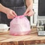 Choice 1/10 XS Size Pink Unprinted Embossed Medium-Duty Plastic T-Shirt Bag - 1,500/Case Choice 1/10 XS Size Pink Unprinted Embossed Medium-Duty Plastic T-Shirt Bag - 1,500/Case