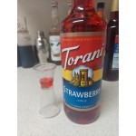 Torani Strawberry Flavoring / Fruit Syrup 750 mL Glass Bottle - 12/Case Torani Strawberry Flavoring / Fruit Syrup 750 mL Glass Bottle - 12/Case