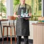 Uncommon Chef 3128 Black Cat Customizable Denim Surge Bib Apron with Black Webbing and 3 Pockets - 34