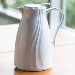 Service Ideas Twist 'N' Serv 67.6 oz. White Plastic Insulated Coffee Carafe / Server with Push-Button Lid TNSPB2WH