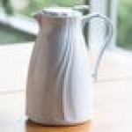 Service Ideas Twist 'N' Serv 67.6 oz. White Plastic Insulated Coffee Carafe / Server with Push-Button Lid TNSPB2WH
