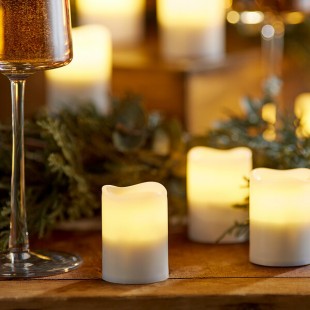 Sterno 60310 2.0 12 Piece Warm White Rechargeable Flameless Votive Set with EasyStack Charging Base, Power Adapter and Timer Remote Starter Kit Sterno 60310 2.0 12 Piece Warm White Rechargeable Flameless Votive Set with EasyStack Charging Base, Power Adapter and Timer Remote Starter Kit