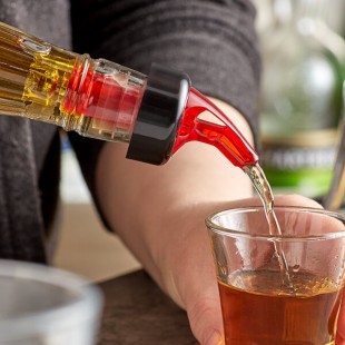 TableCraft 1.5 oz. Red Spout / Yellow Tail Measured Liquor Pourer with Collar 2249A - 12/Pack