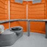 PolyJohn SA1-1011 We'll Care III Orange Wheelchair Accessible Portable Restroom - Assembled