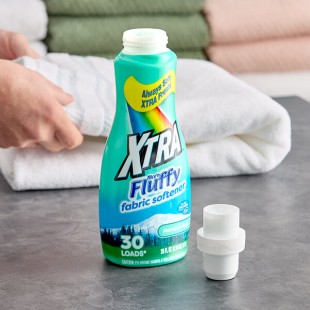 XTRA Nice'N Fluffy 25 oz. Mountain Rain Liquid Fabric Softener - 12/Case