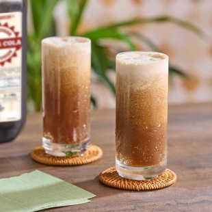 Tiki Breeze Pepper Cola Soda 5:1 Concentrate 67.6 fl. oz. - 6/Case Tiki Breeze Pepper Cola Soda 5:1 Concentrate 67.6 fl. oz. - 6/Case
