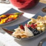 Vollrath 46222 Double Wall Stainless Steel Curved Platter - 12 Vollrath 46222 Double Wall Stainless Steel Curved Platter - 12