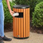 Lancaster Table & Seating 11 Gallon Steel / Wood Composite Round Decorative Outdoor Trash Can with Side Opening Lancaster Table & Seating 11 Gallon Steel / Wood Composite Round Decorative Outdoor Trash Can with Side Opening
