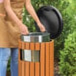 Lancaster Table & Seating 11 Gallon Steel / Wood Composite Round Decorative Outdoor Trash Can with Side Opening Lancaster Table & Seating 11 Gallon Steel / Wood Composite Round Decorative Outdoor Trash Can with Side Opening