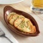 Tuxton DMN-045 Mahogany 4.5 oz. Oval China Welsh Rarebit - 12/Case