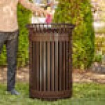 Lancaster Table & Seating 45 Gallon Heavy-Duty Round Brown Steel Slatted Outdoor Trash Can with Flat Lid and Door Lancaster Table & Seating 45 Gallon Heavy-Duty Round Brown Steel Slatted Outdoor Trash Can with Flat Lid and Door
