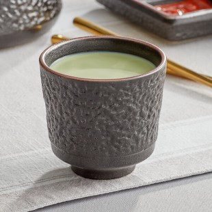Acopa Heika 5 oz. Black Matte Textured Stoneware Tea Cup - Sample