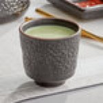 Acopa Heika 5 oz. Black Matte Textured Stoneware Tea Cup - Sample