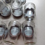 Choice 8 oz. Half-Pint Regular Mouth Glass Canning / Mason Jar with Silver Metal Lid and Band - 12/Case