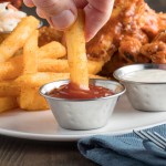 Choice 1.5 oz. Hammered Stainless Steel Round Sauce Cup - 12/Pack