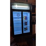 Avantco CSM-4-HC Black Customizable Countertop Display Refrigerator with Sliding Door and Merchandising Panel