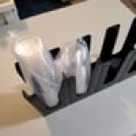 Choice Red 4-Section Adjustable Slanted Countertop Cup and Lid Organizer