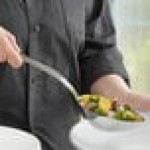 Vollrath 46725 Miramar® 6 oz. Stainless Steel Open Handle Solid Oval Serving Spoon