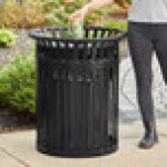 Lancaster Table & Seating 36 Gallon Heavy-Duty Round Black Steel Slatted Outdoor Trash Can with Flat Lid