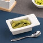 Ariane Miniature 2.71 oz. Ivory Rectangular Porcelain Deep Bowl with Offset Wide Rim - 18/Case