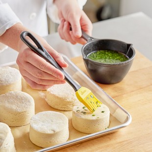 Lodge LMPB21 15 oz. Pre-Seasoned Cast Iron Melting Pot with Silicone Basting Brush