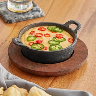 Valor 12 oz. Pre-Seasoned Mini Cast Iron Round Serving Bowl with Rustic Chestnut Finish Rubberwood Underliner Valor 12 oz. Pre-Seasoned Mini Cast Iron Round Serving Bowl with Rustic Chestnut Finish Rubberwood Underliner