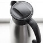 Service Ideas Portion Control Server 33.8 oz. Stainless Steel Insulated Coffee Carafe / Server with Black Lid 1000NK-N