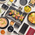 Acopa Ugoki 28 oz. Matte Black Melamine Bowl with Ivory Rim - 12/Pack Acopa Ugoki 28 oz. Matte Black Melamine Bowl with Ivory Rim - 12/Pack