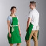 Choice Kelly Green Poly-Cotton Adjustable Bib Apron with 2 Pockets and Natural Webbing Accents - 32