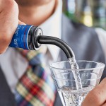 Acopa Black Angled Liquor Speed Pourer - 12/Pack
