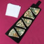 Cal-Mil 1535-24-13 Black Trapezoid Flat Bread Serving / Display Board with Handle - 23 3/4 Cal-Mil 1535-24-13 Black Trapezoid Flat Bread Serving / Display Board with Handle - 23 3/4