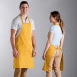 Choice Navy Blue Poly-Cotton Standard Bib Apron with 2 Pockets - 34 Choice Navy Blue Poly-Cotton Standard Bib Apron with 2 Pockets - 34