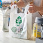 Choice 1/6 Standard Size 3 Mil White Reusable Extra Heavy Duty Plastic T-Shirt Bag - 150/Case Choice 1/6 Standard Size 3 Mil White Reusable Extra Heavy Duty Plastic T-Shirt Bag - 150/Case