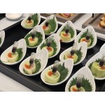 Acopa 2 oz. Bright White Porcelain Slant Appetizer / Tasting Spoon - 12/Pack Acopa 2 oz. Bright White Porcelain Slant Appetizer / Tasting Spoon - 12/Pack