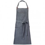 Mercer Culinary M63200DEN Metro Edge Flannery Indigo Dobby Denim Bib Apron with Adjustable Neck, Leather Towel Holder, and 3 Pockets - 34 1/4 Mercer Culinary M63200DEN Metro Edge Flannery Indigo Dobby Denim Bib Apron with Adjustable Neck, Leather Towel Holder, and 3 Pockets - 34 1/4