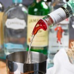 TableCraft 149A 1.25 oz. Red Spout / Clear Tail Measured Liquor Pourer without Collar - 12/Pack TableCraft 149A 1.25 oz. Red Spout / Clear Tail Measured Liquor Pourer without Collar - 12/Pack