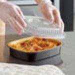 Choice Heavy Duty Smoothwall Black and Gold Medium Oblong Foil Entree / Take-Out Pan with Dome Lid 47.4 oz. - 50/Case Choice Heavy Duty Smoothwall Black and Gold Medium Oblong Foil Entree / Take-Out Pan with Dome Lid 47.4 oz. - 50/Case